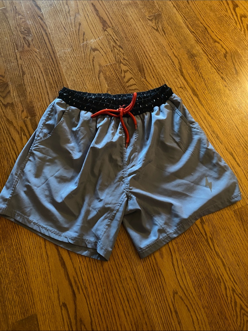 Men's Gray Bruce Bolt Shorts with red athletic liner
